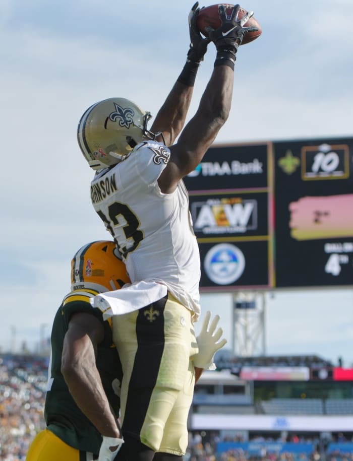 Saints TE Juwan Johnson pulls in a touchdown pass from quarterback (2) Jameis Winston against the the Green Bay Packers. Bob Self/Florida Times-Union via Imagn Content Services, LLC
